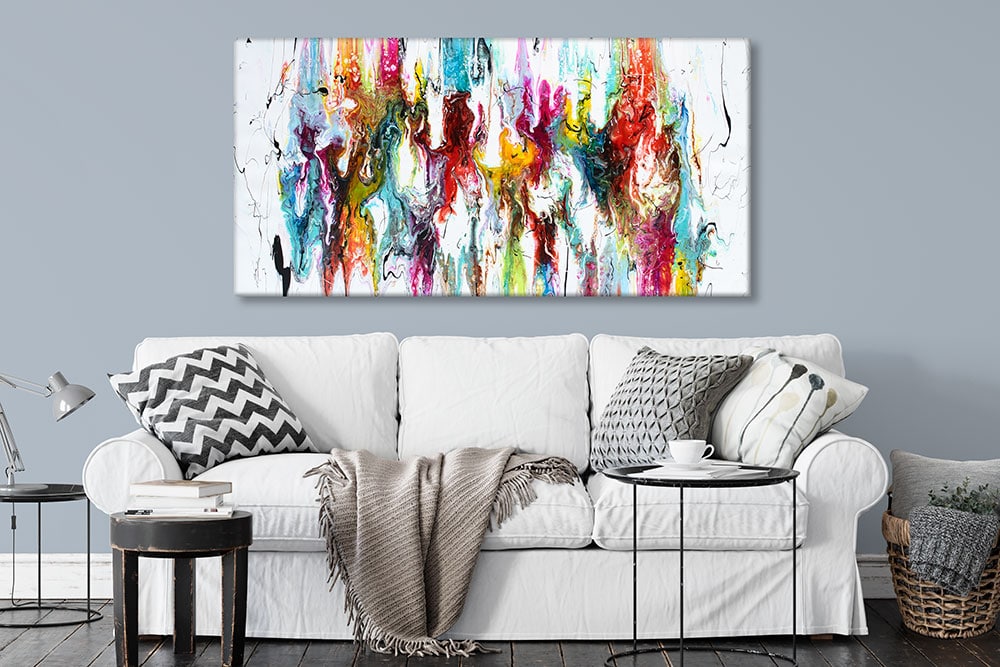 Lærredstryk i flotte farver over sofaen Alloy I 70x140 cm